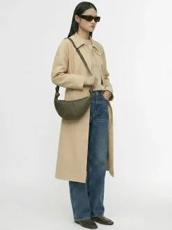 Borsa piccola Croissant in pelle martellata