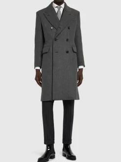 Cappotto doppiopetto in lana spigata