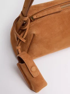 Elongated suede shoulder bag