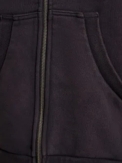Felpa in cotone washed con zip e cappuccio