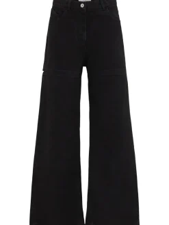 Jeans ampi in tela washed con cutout