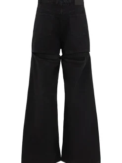 Jeans ampi in tela washed con cutout