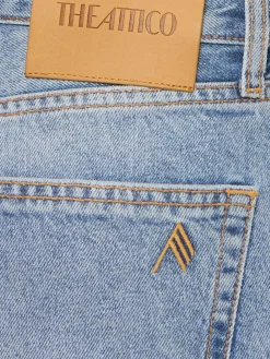 Jeans dritti in denim spalmato