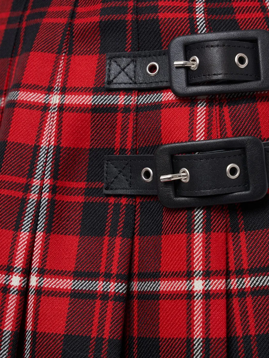 Minigonna in lana tartan plissé con fibbie