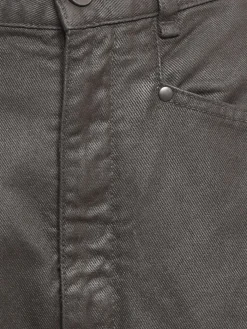 Pantaloni spalmati