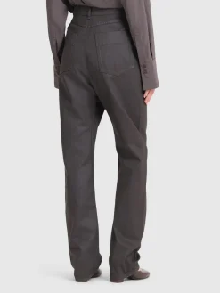 Pantaloni spalmati