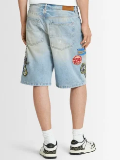 Shorts in denim con patch