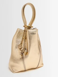 Spin metallic leather top handle bag