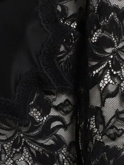 Top stretch con pizzo